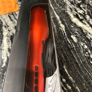 Vibrant Red Hair Styling Tool